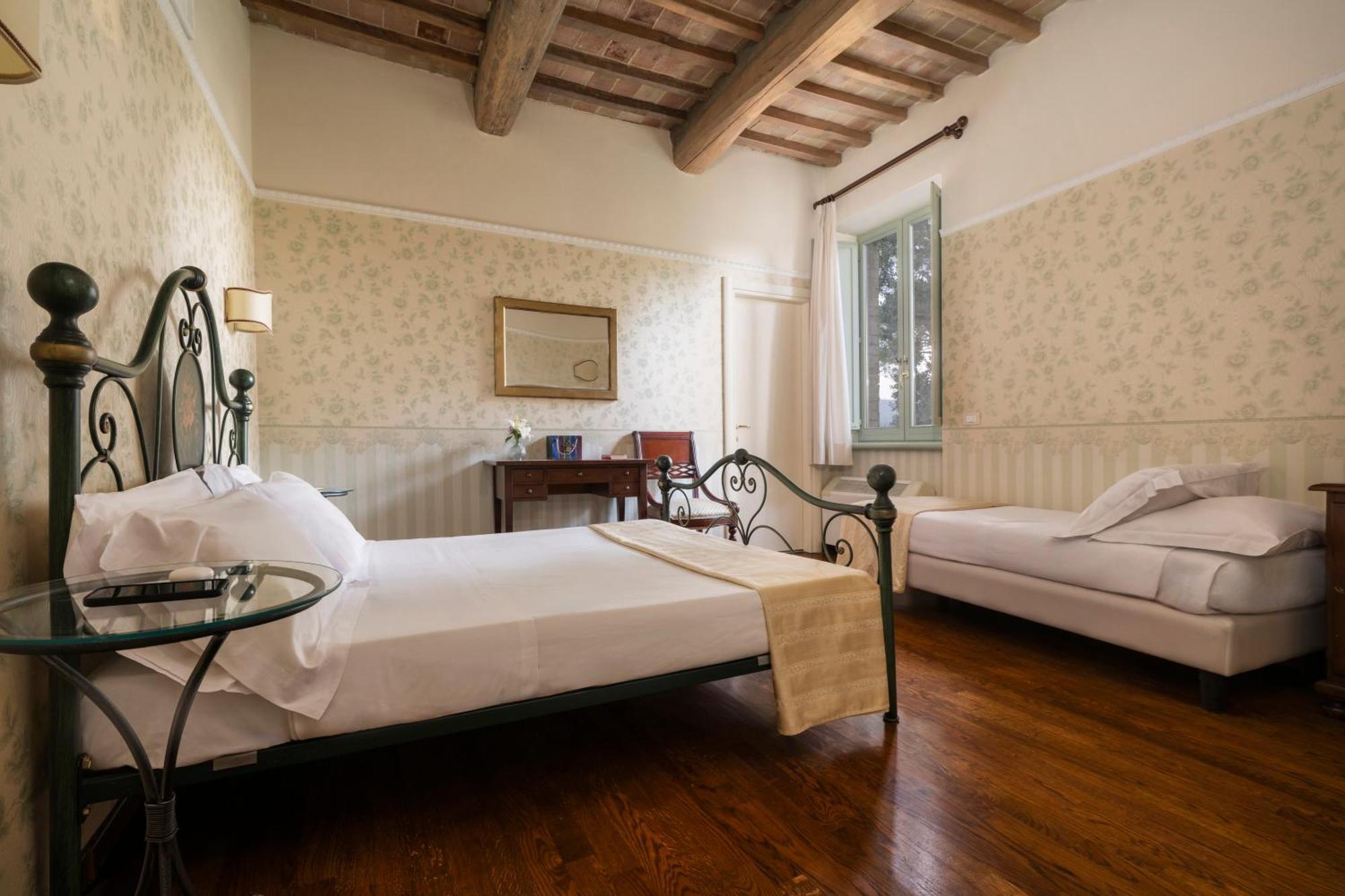 Отель Relais Parco Dei Cavalieri Assisi Петриньяно Экстерьер фото