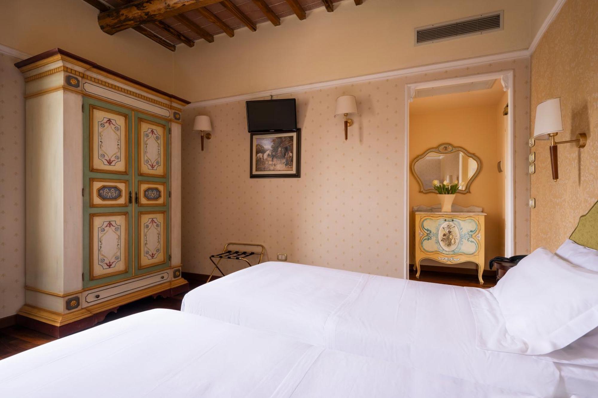 Отель Relais Parco Dei Cavalieri Assisi Петриньяно Экстерьер фото