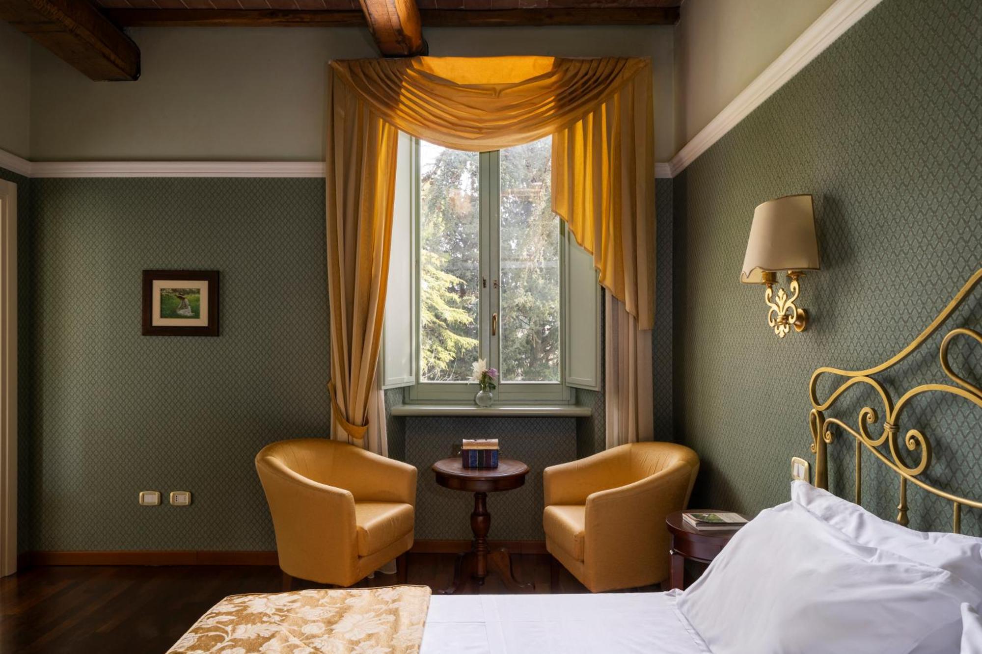 Отель Relais Parco Dei Cavalieri Assisi Петриньяно Экстерьер фото
